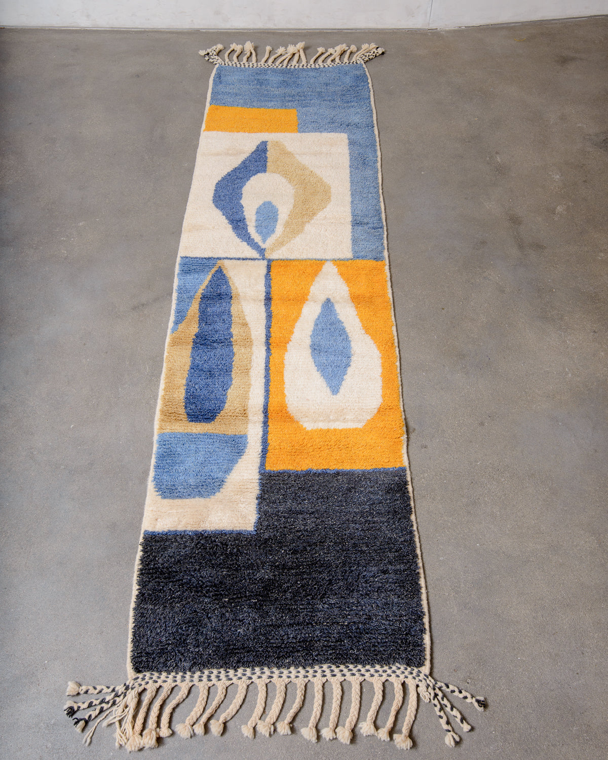Modern, designer, handcrafted Berber runner rug from Morocco. Beniourain carpet with beautiful colours and patterns and fluffy wool texture.